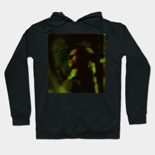 Portrait, digital collage and special processing. Man looking somewhere. He's strong. Green and red. Hoodie